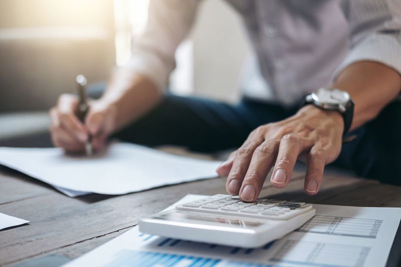 Person balancing a checkbook